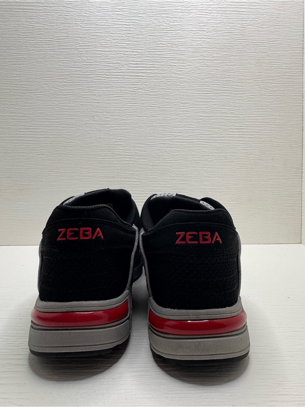 Men's Black Athletic Shoes with Red Accents